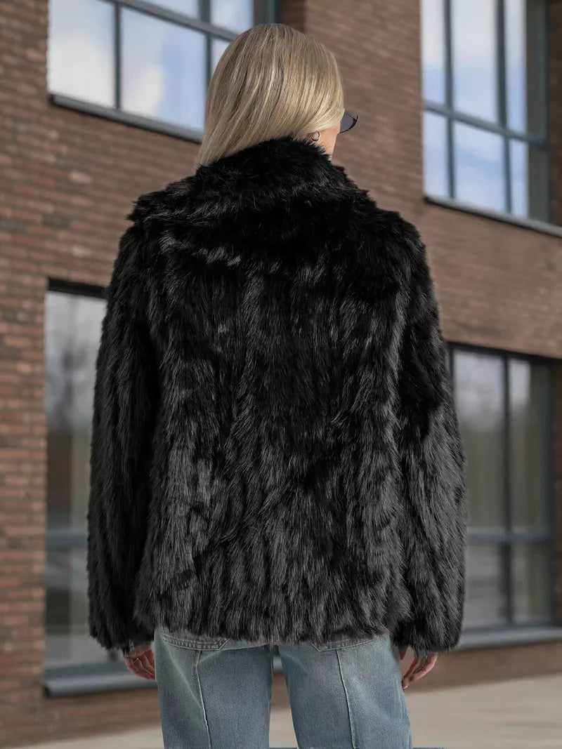 Women's black fur jacket Moda