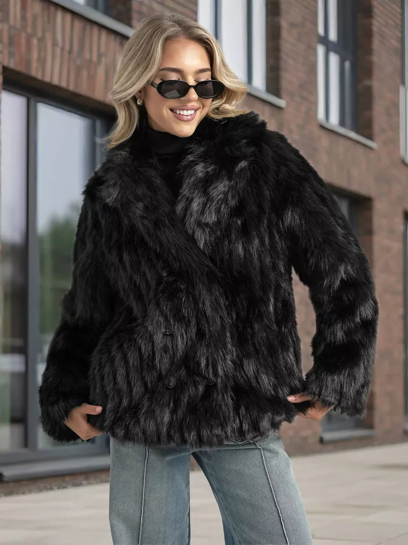 Women's black fur jacket Moda