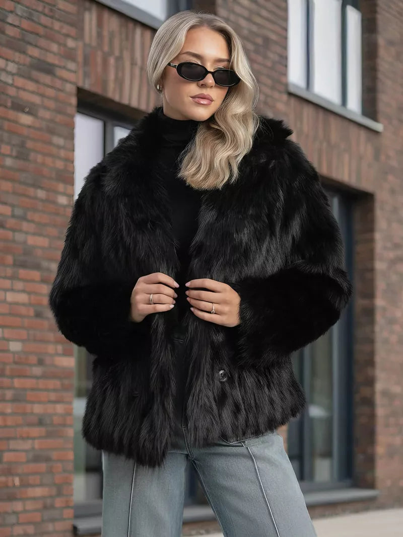 Women's black fur jacket Moda