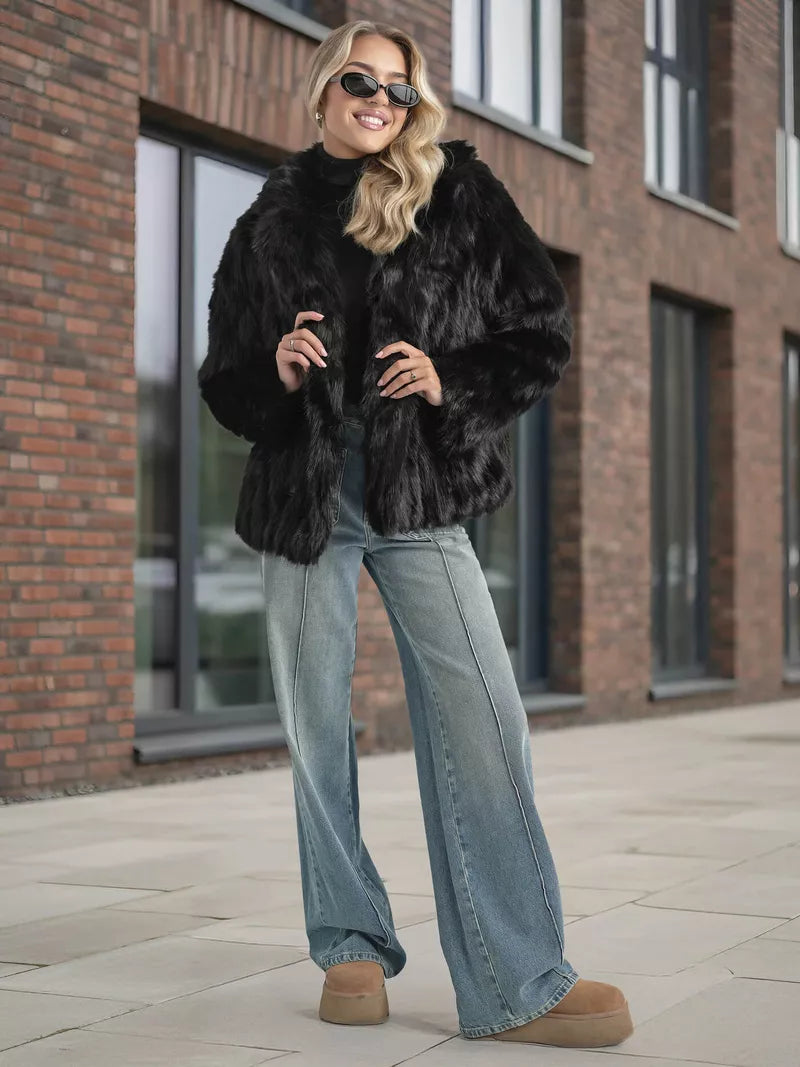 Women's black fur jacket Moda