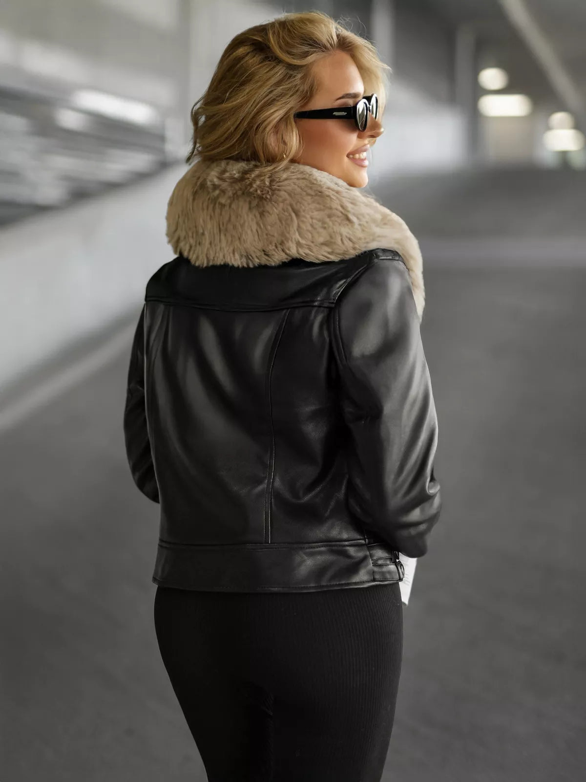 Women's black leather jacket with brown fur Laser