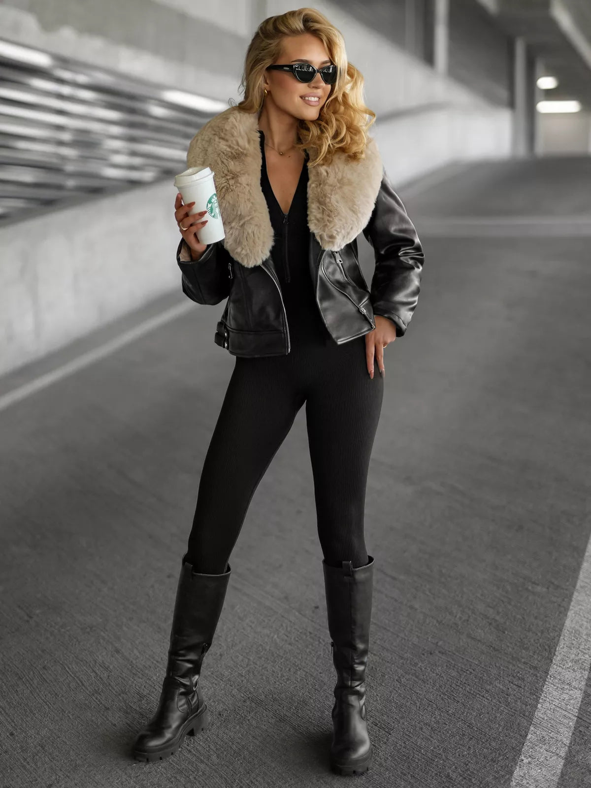 Women's black leather jacket with brown fur Laser