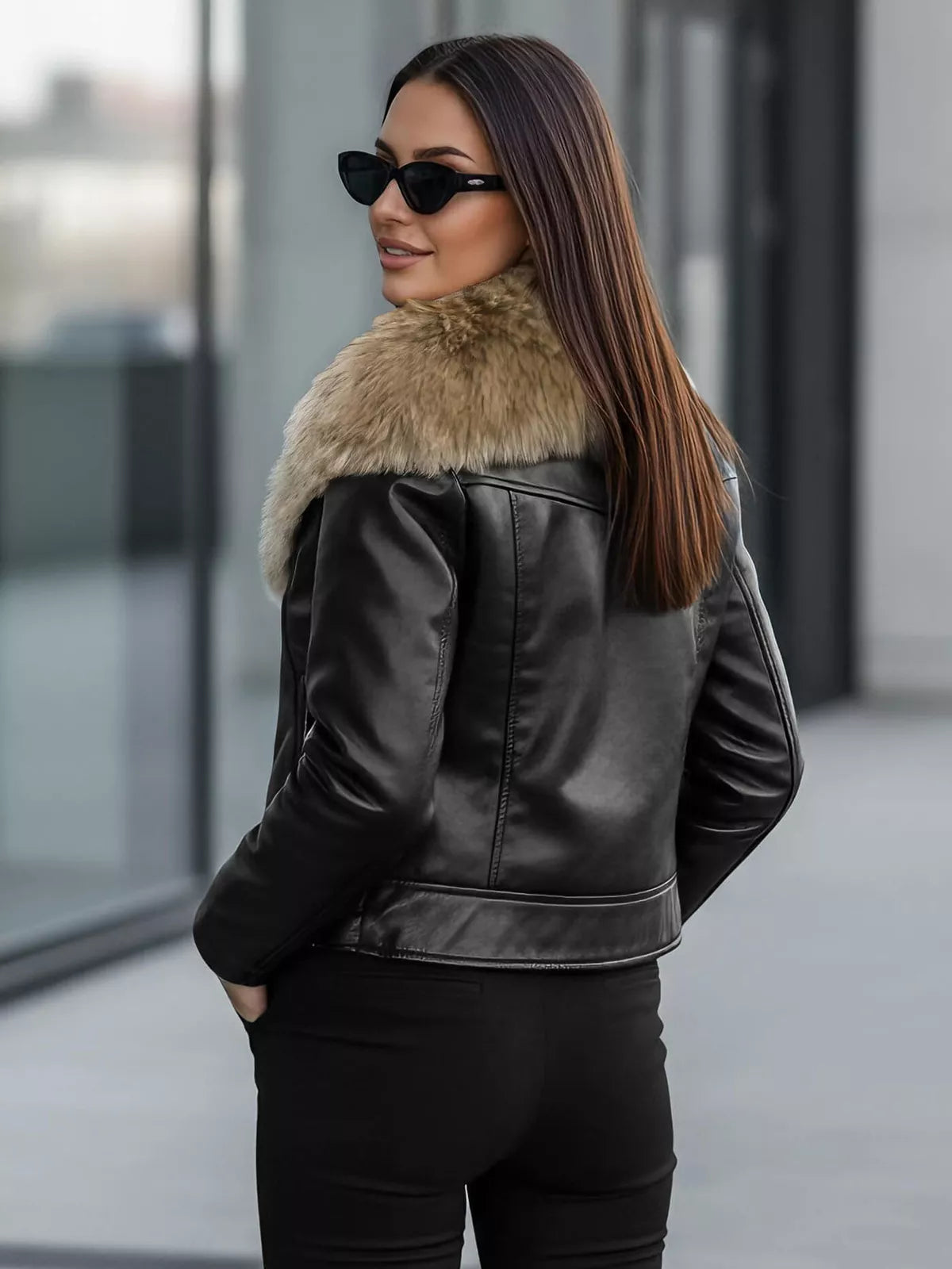 Women's black leather jacket with brown fur Laser
