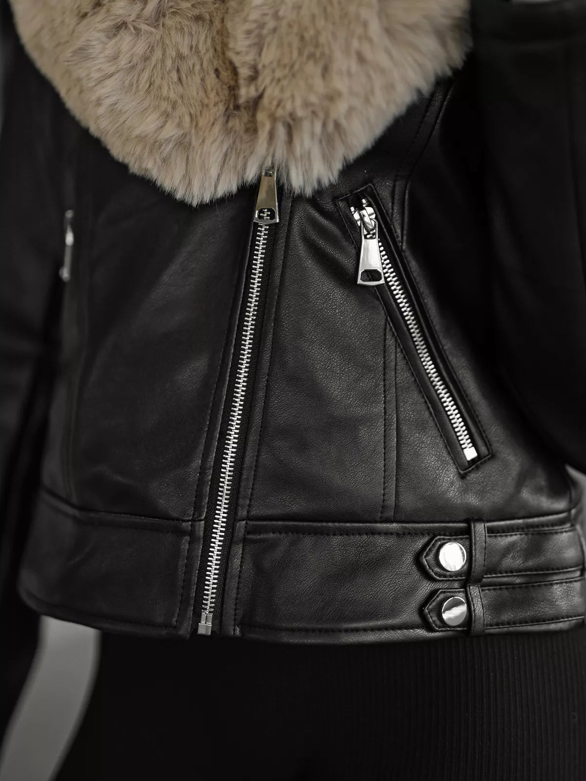 Women's black leather jacket with brown fur Laser