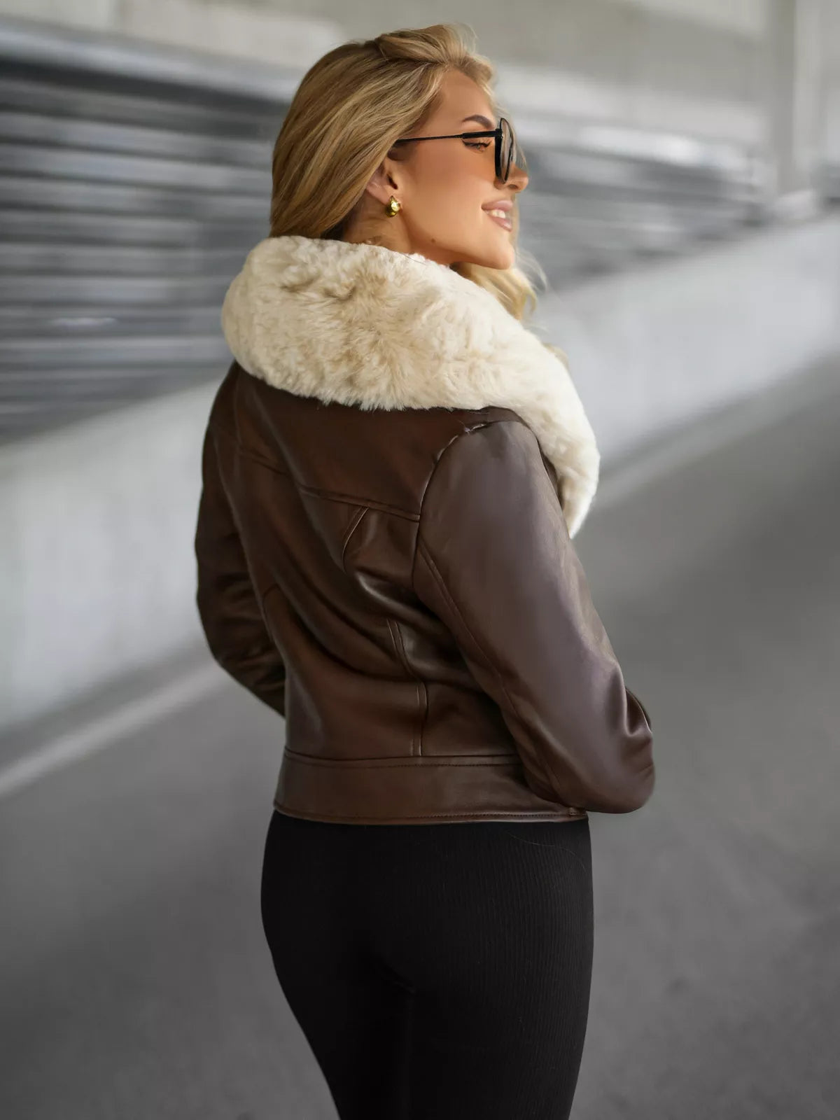 Women's brown leather jacket with fur Laser