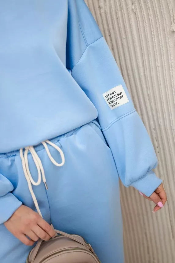 Women's light blue Vesta suit.