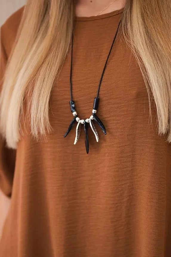 Women's brown Elis suit.