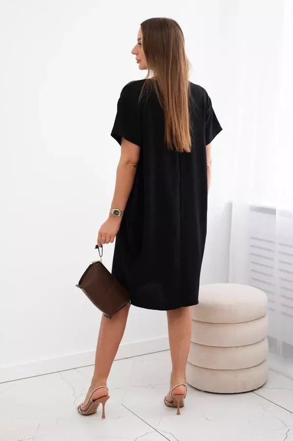 Black dress with pockets and pendant Deli 