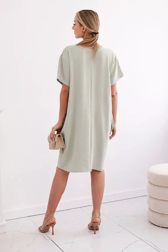 Grey dress with pockets and pendant Deli 