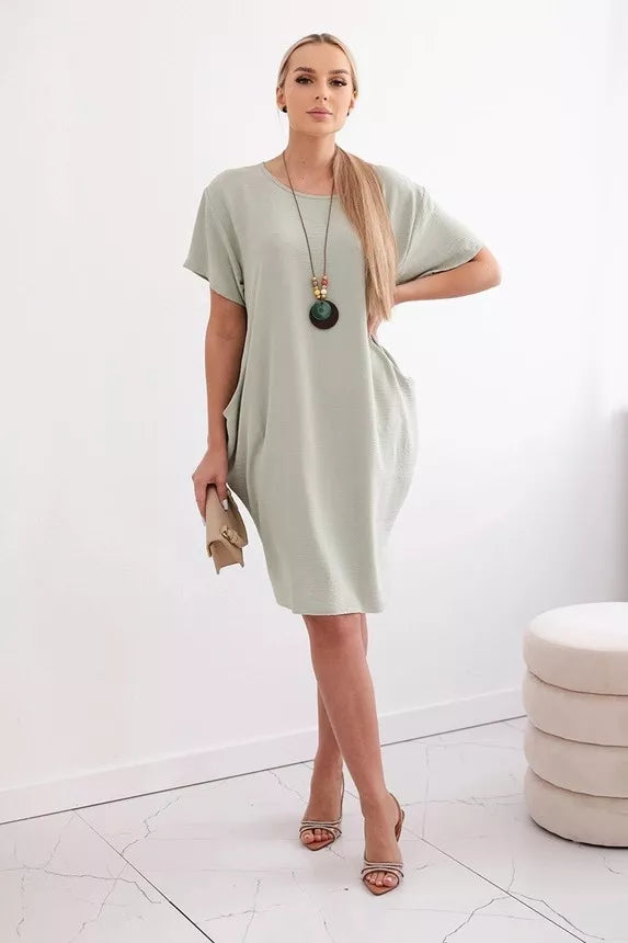 Grey dress with pockets and pendant Deli 