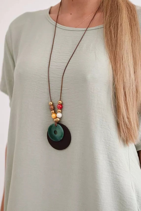 Grey dress with pockets and pendant Deli 