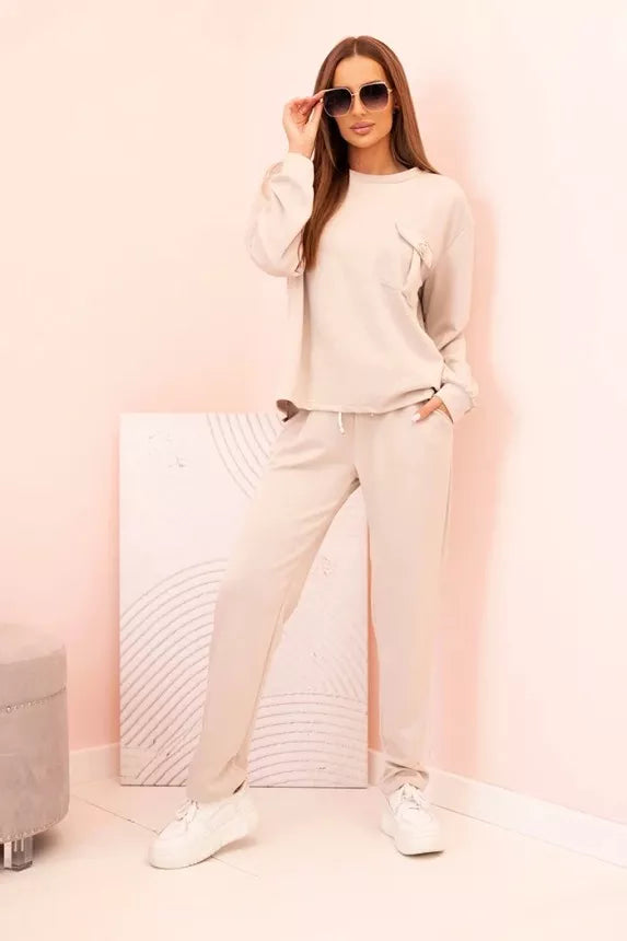 Naomi women's light brown suit.