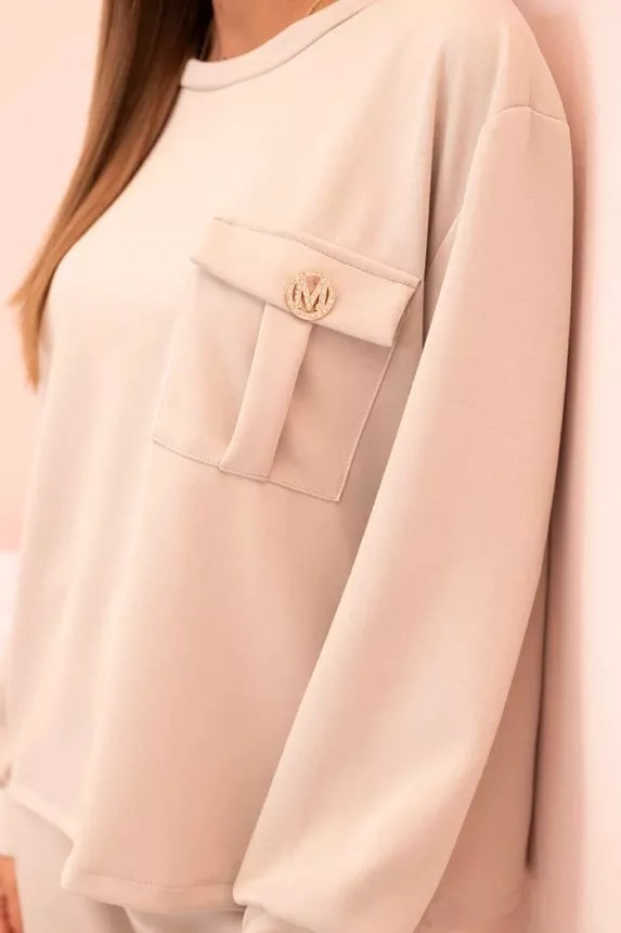 Naomi women's light brown suit.