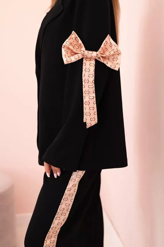 Women's black Rene suit.