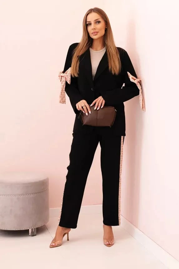 Women's black Rene suit.