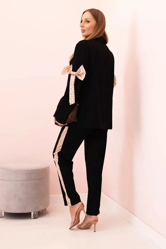 Women's black Rene suit.