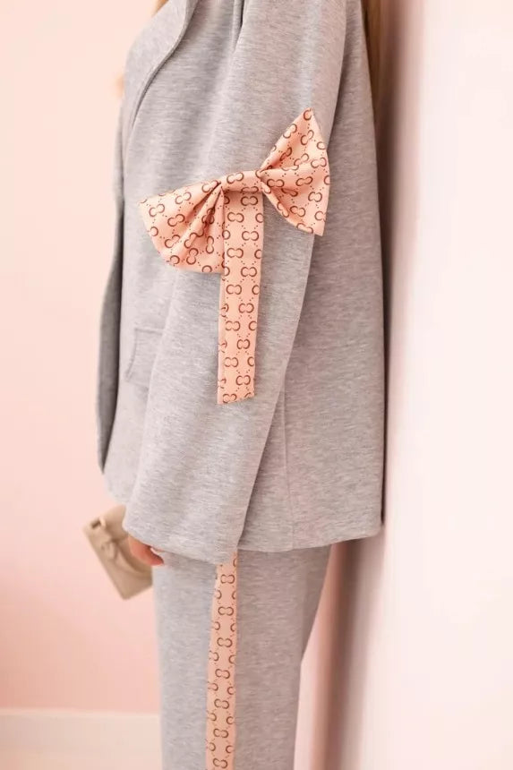 Women's grey Rene suit.