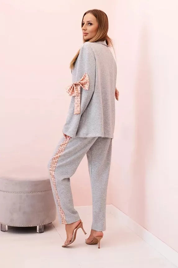 Women's grey Rene suit.