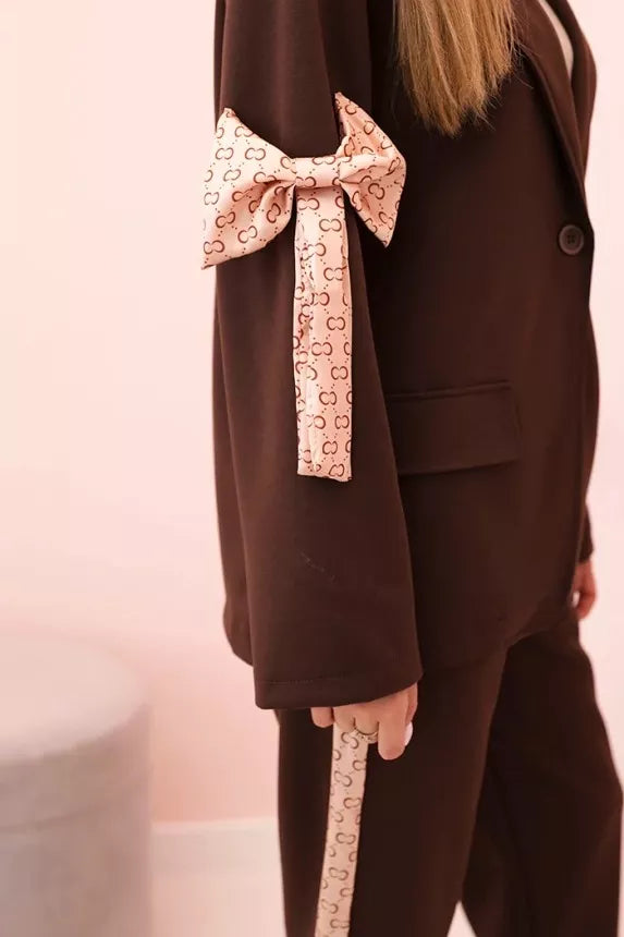 Women's brown Rene suit.