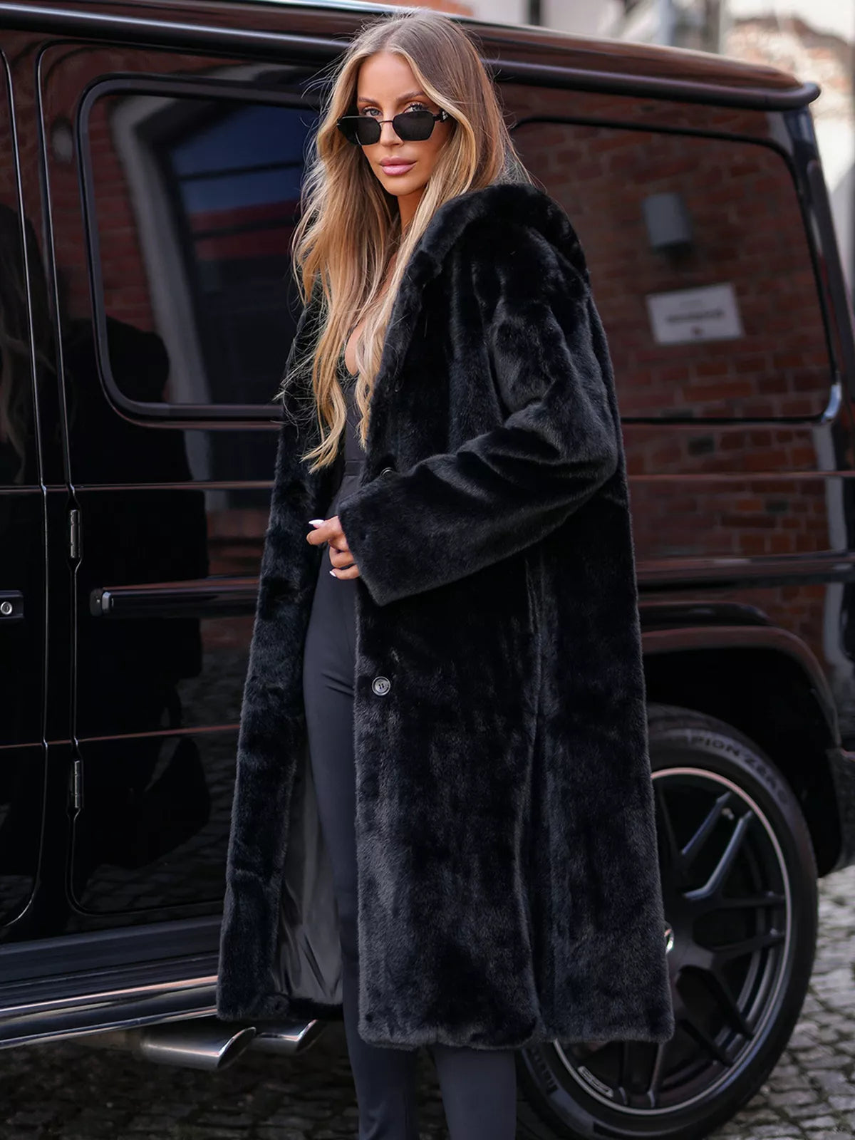 Women's long black winter jacket made of faux fur Vesta