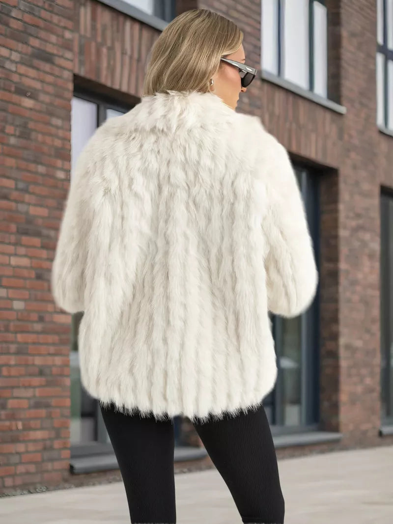 Women's white fur jacket Moda
