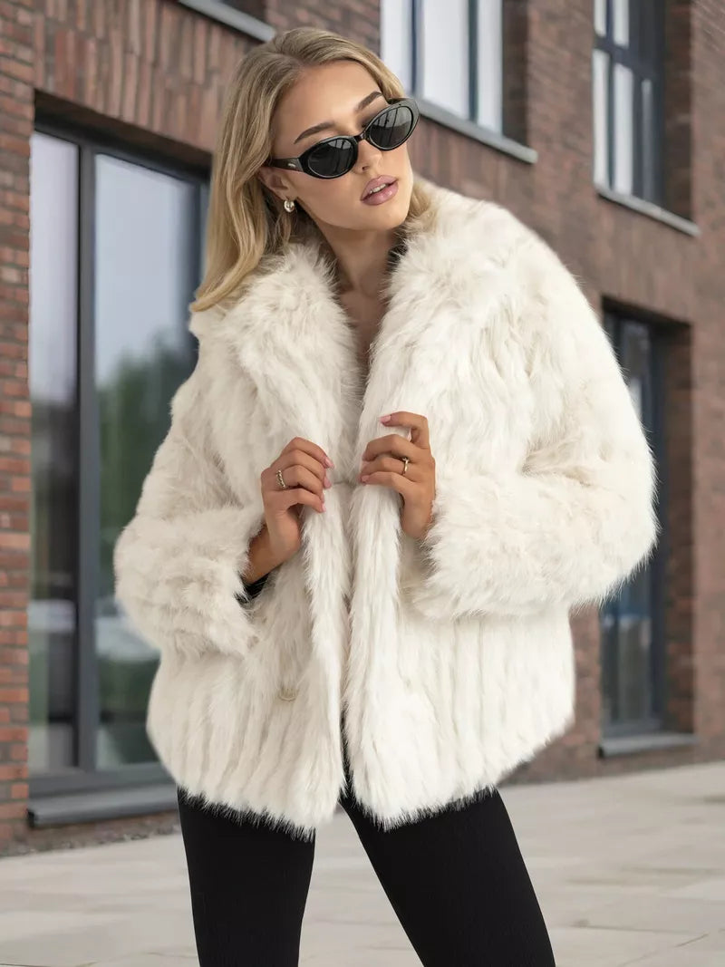 Women's white fur jacket Moda
