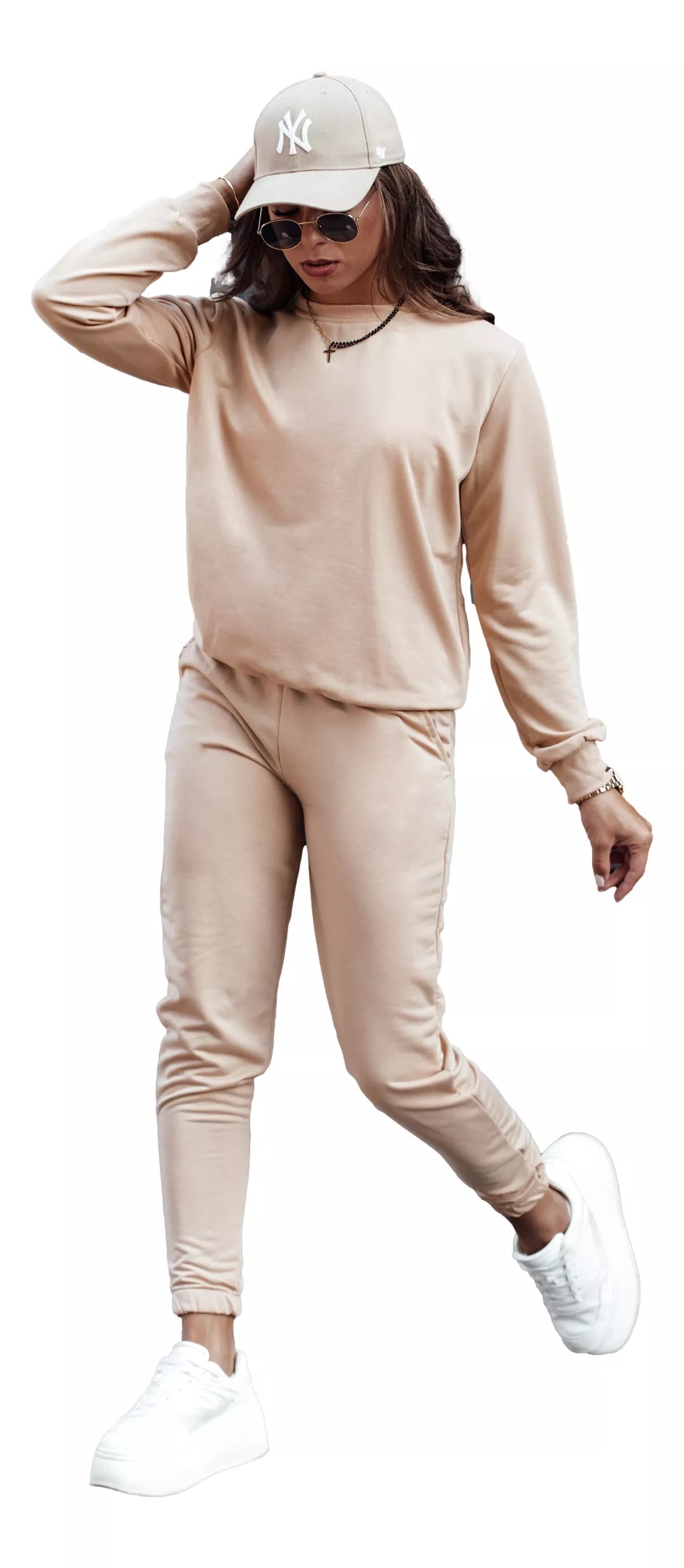 Women's light brown suit by Milin.