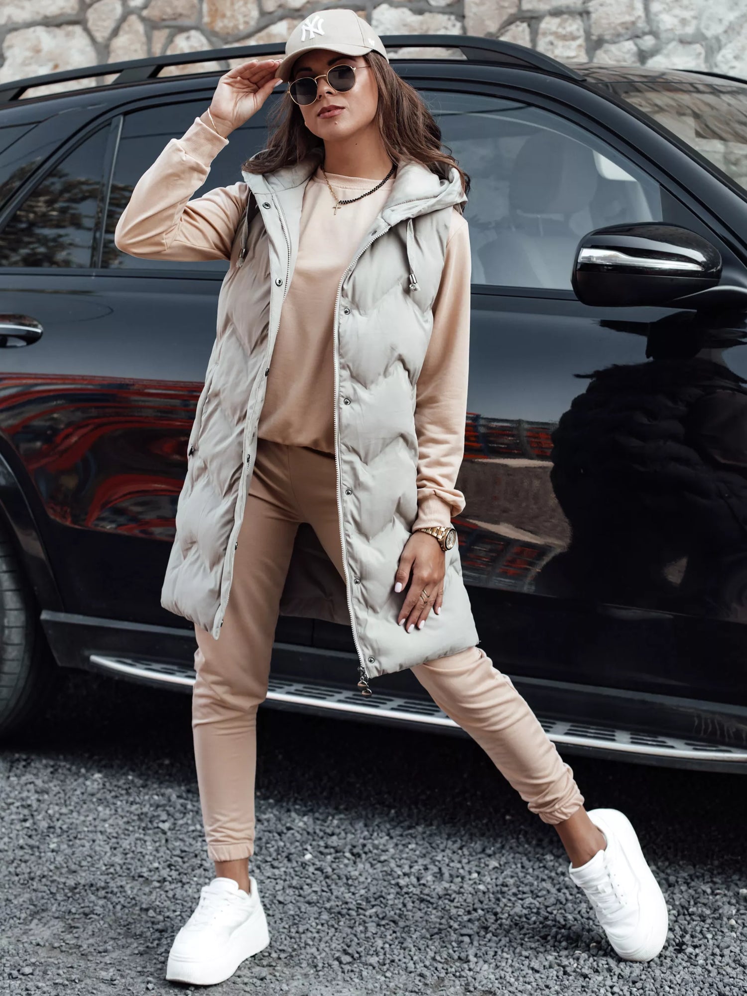 Women's light brown suit by Milin.