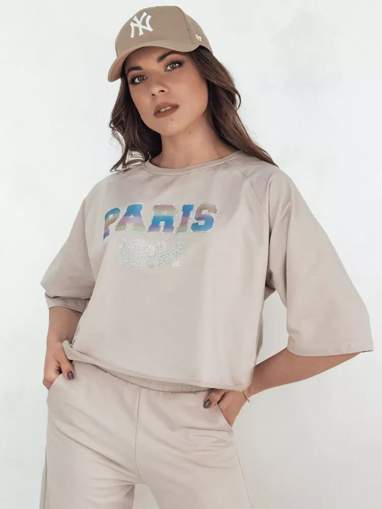 Women's light brown Rosin suit.