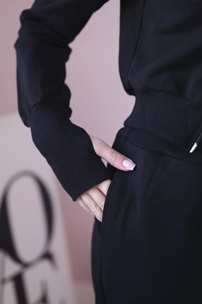 Women's black Donni set.