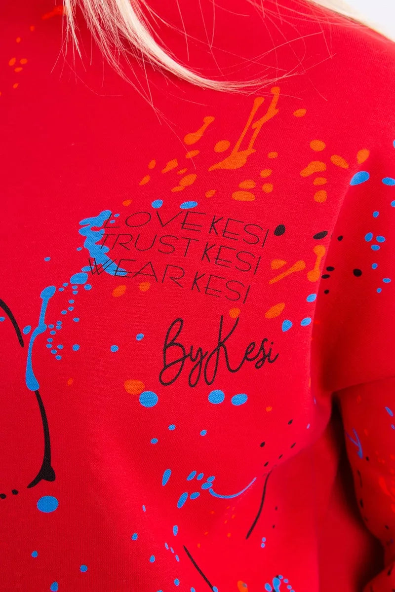 Women's red Splash outfit.