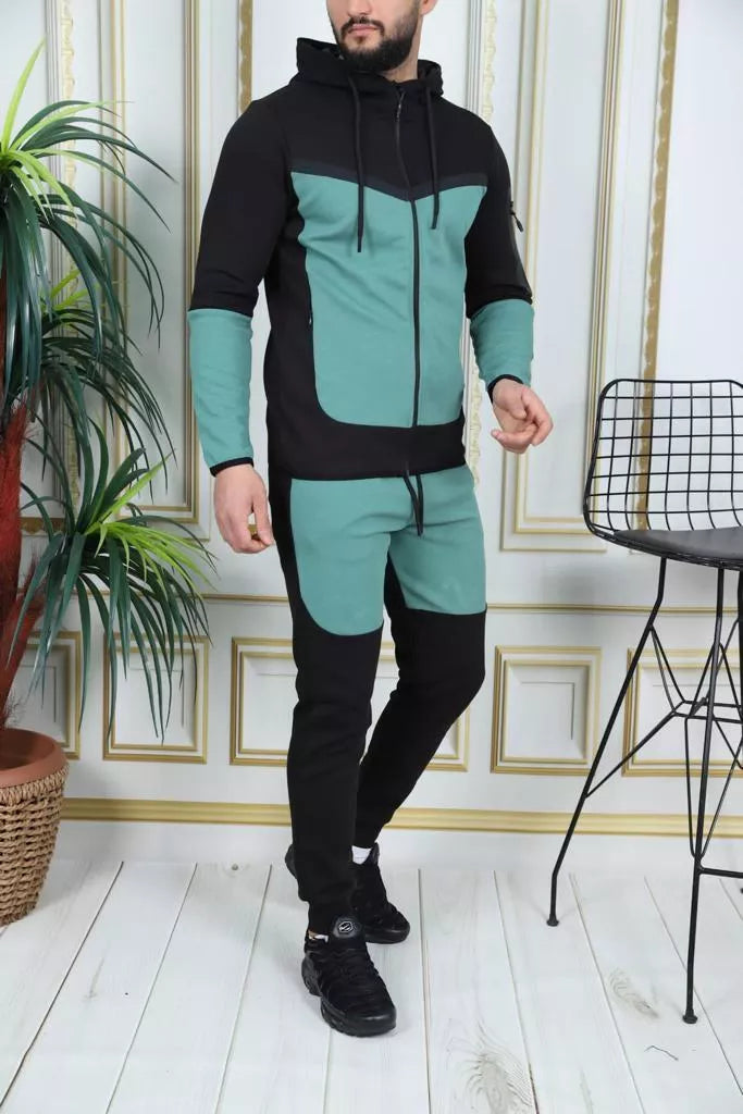Men's black and mint green Rener sports set.