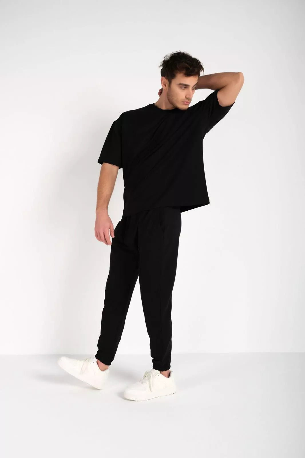 Men's black SumerTop suit.