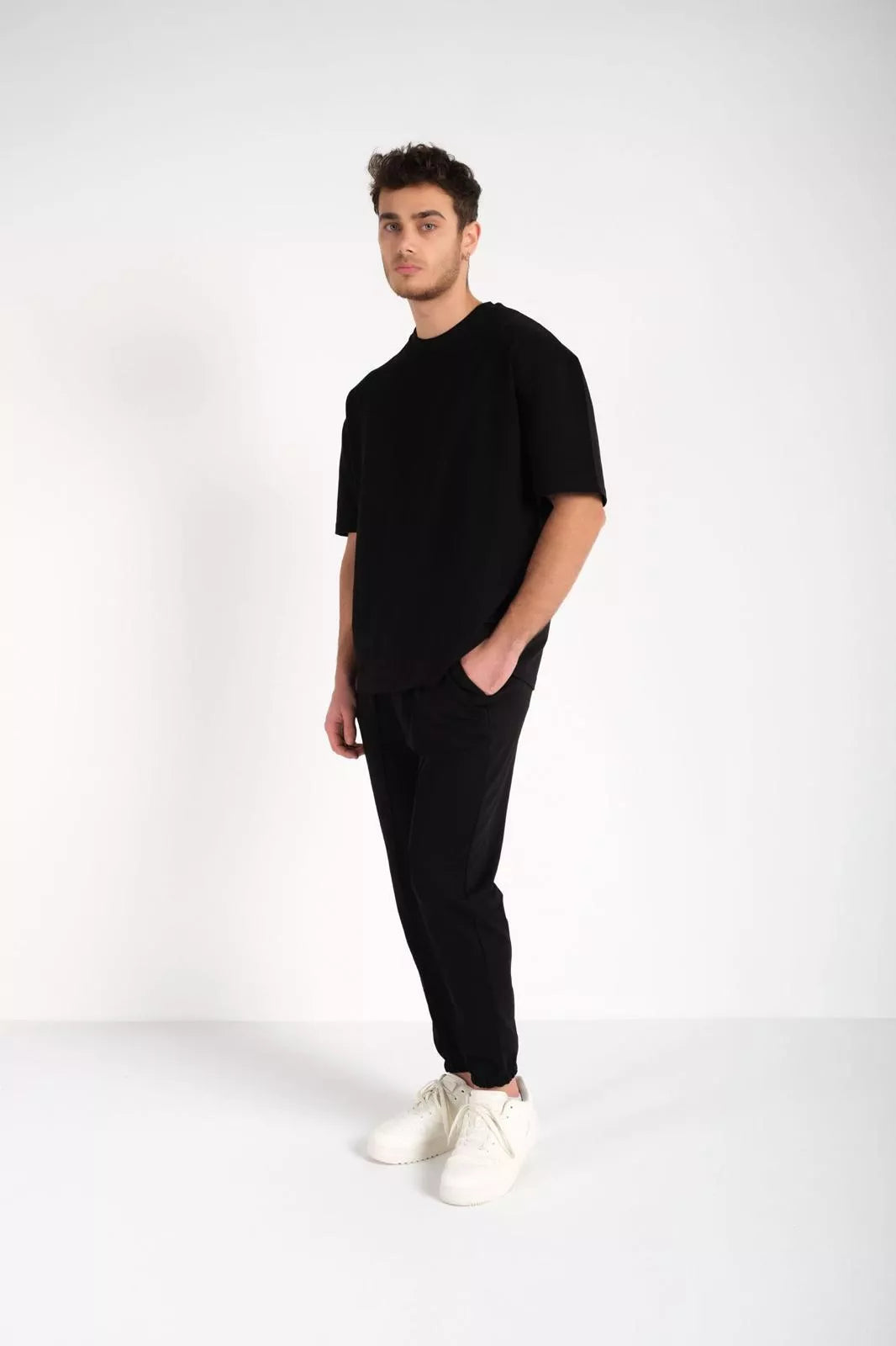 Men's black SumerTop suit.