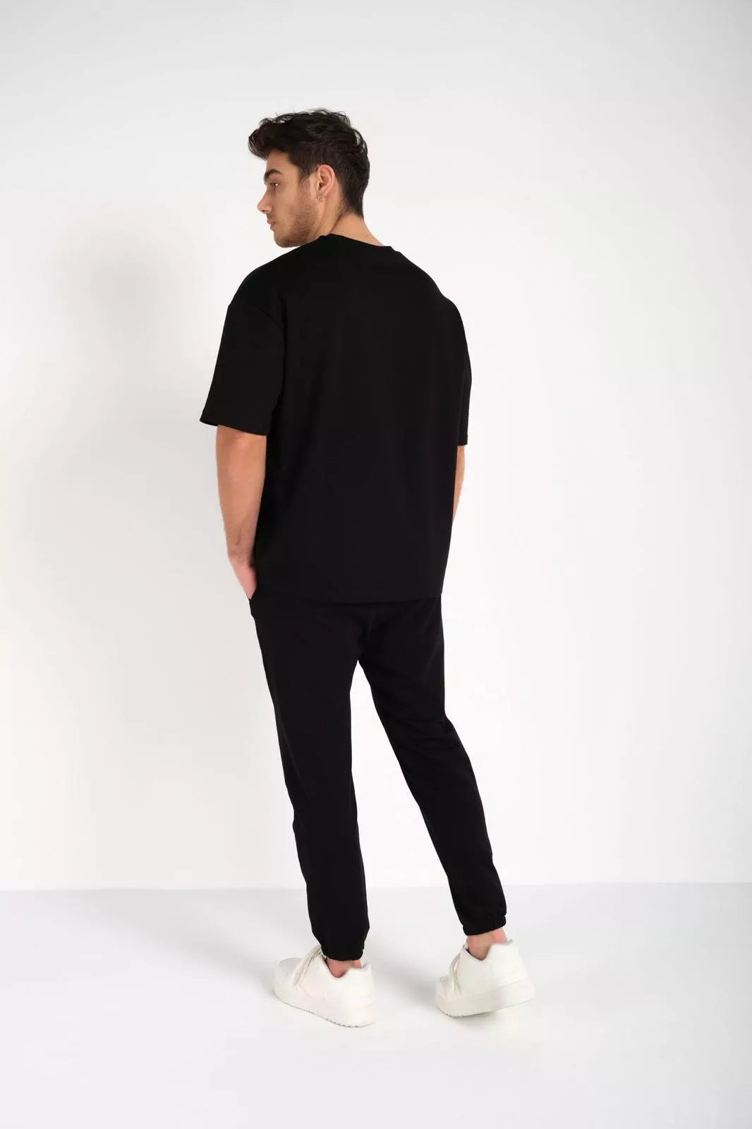 Men's black SumerTop suit.