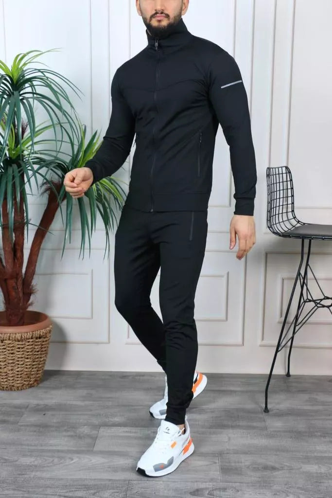 Men's black Koter sports set.