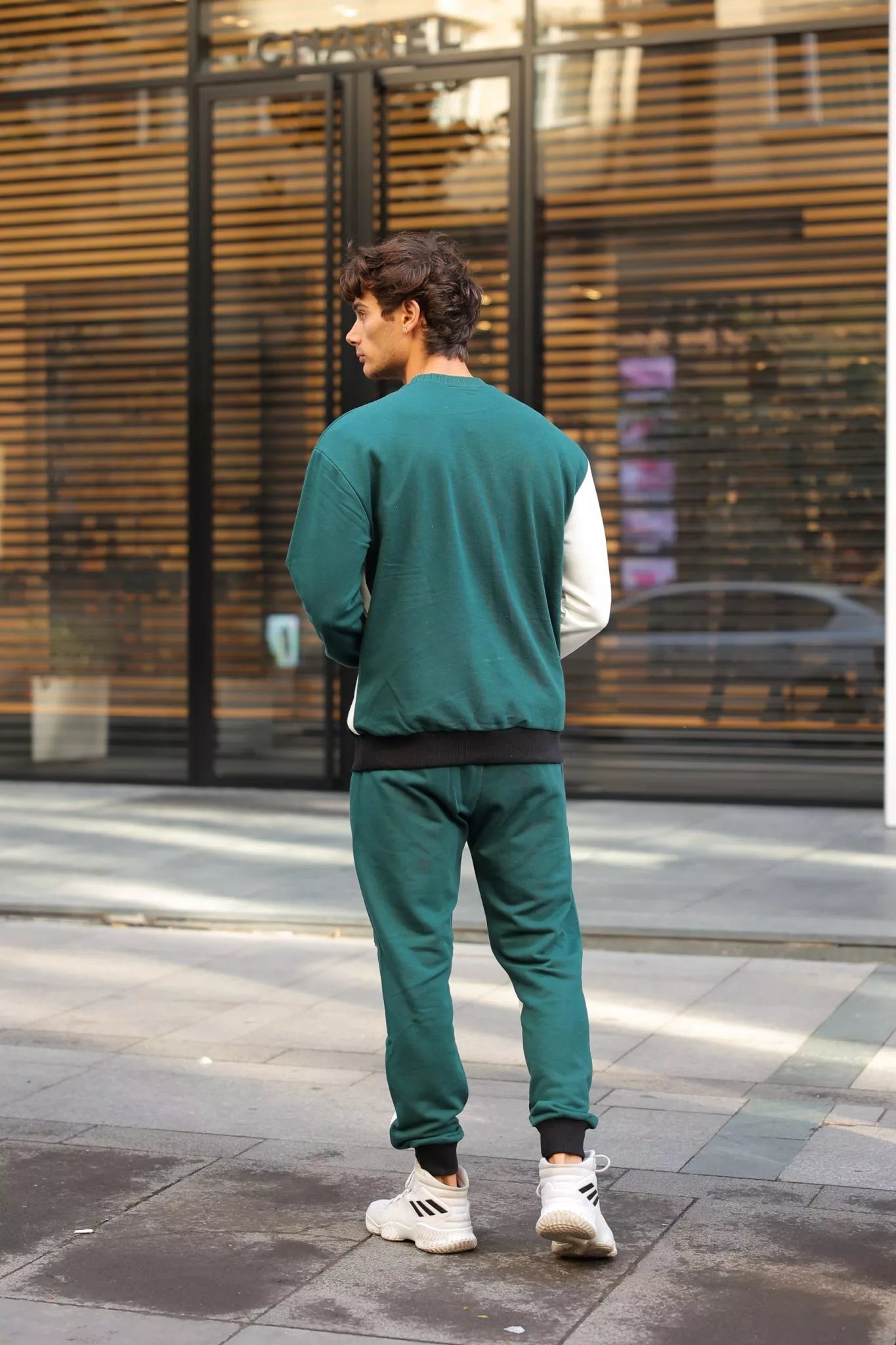 Green men's set with multiple colors, Hipos brand.